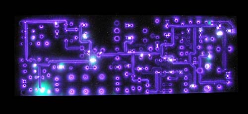 Kirlian photograph of a circuit-board – purple corona
